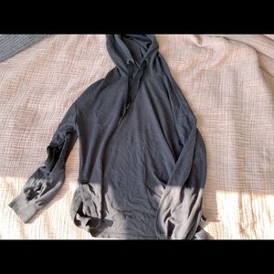 black hoodie with gold ended string & side slits